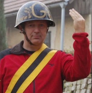 Jan z Helvajzu, gaspár s korunkou, bývalá sláva, samozvaný vůdce, hrobník idejí. 